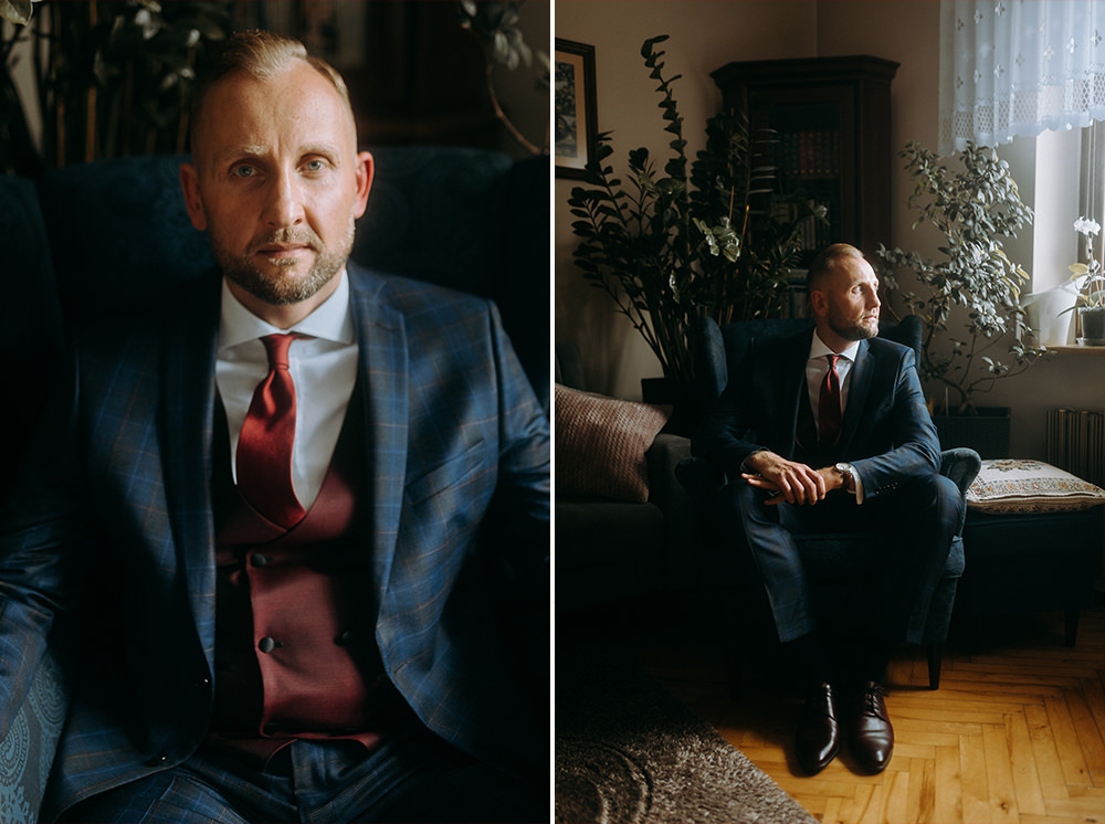 Elegancki portret pana młodego w garniturze. Mężczyzna siedzi w fotelu i patrzy w bok.